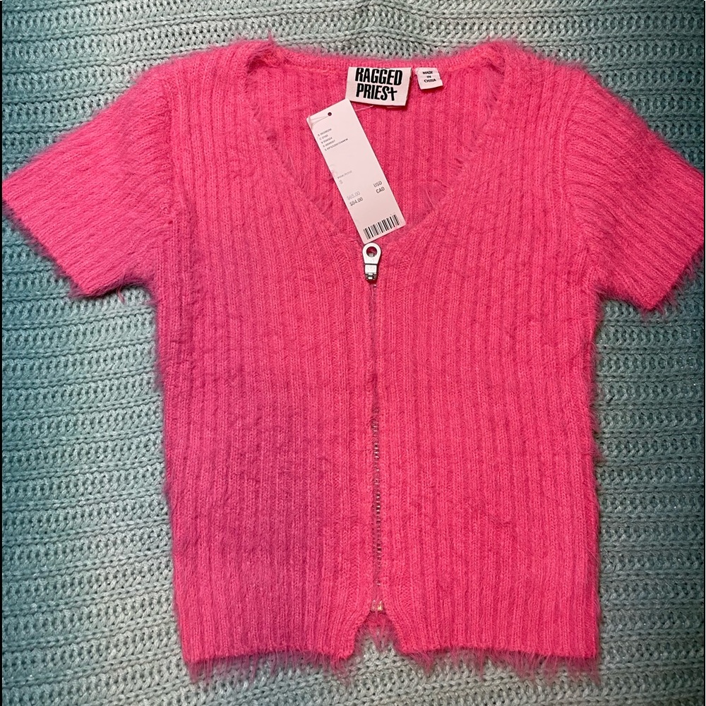 New with tags. Pink sexy sweater.💕